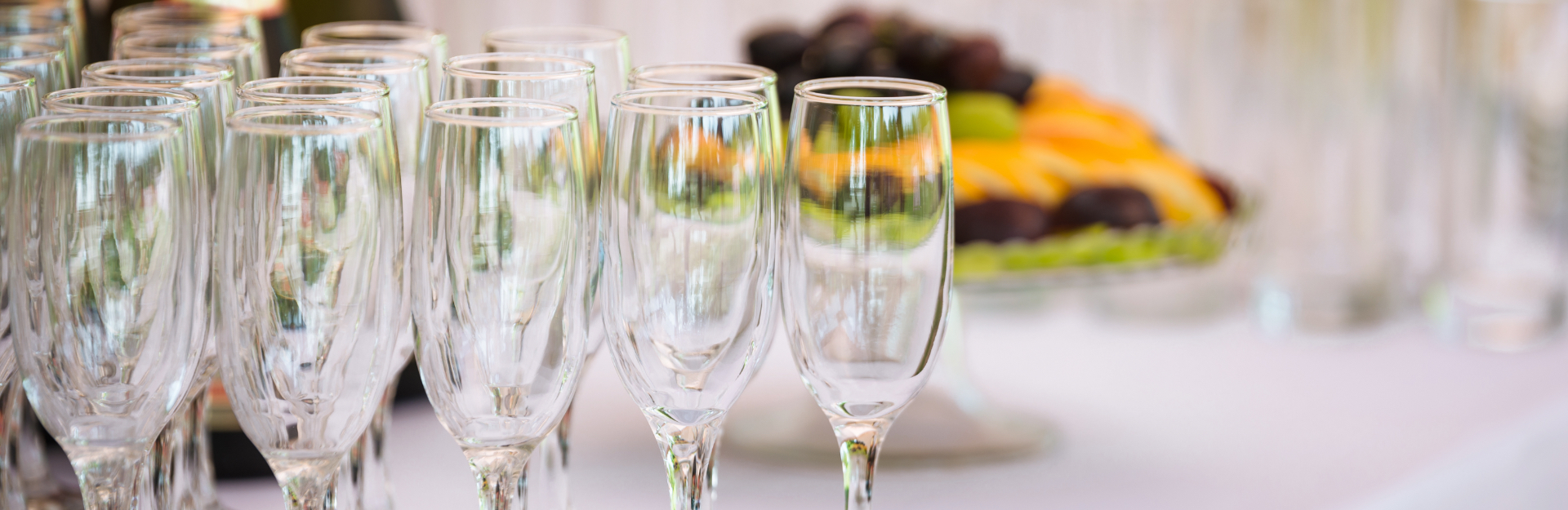 Champagne flute glasses on tabletop
